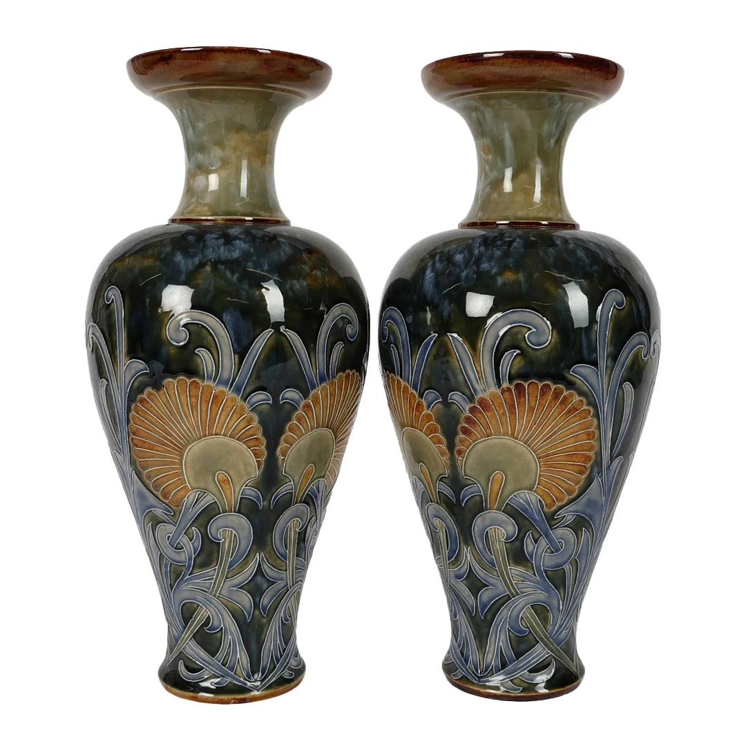 A PAIR OF DOULTON LAMBETH VASES BY FLORENCE BARLOW WITH FOLIATE DECORATION. — European — Bishop & Miller
