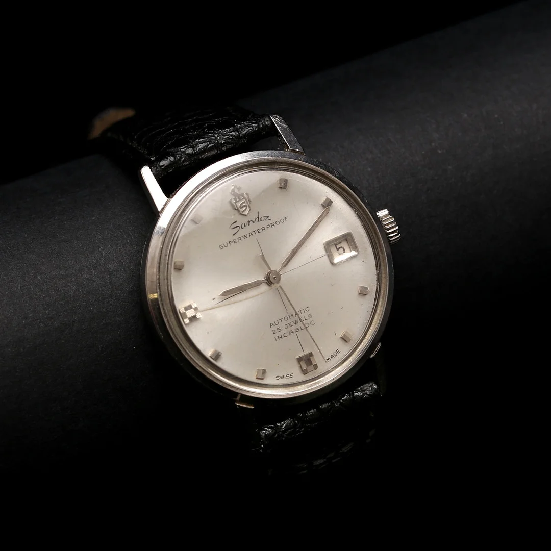 SANDOZ AQUAPLANE SUPERWATERPROOF, herrarmbandsur, automatic, 1960-tal. — Wristwatches — Auktionshuset Thelin & Johansson