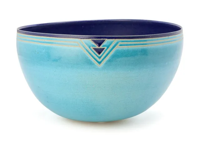 Large stoneware bowl decorated with light blue and blue glazes and with unglazed geometric line decoration. Signed monogram, 92. Unique. H. 21.5–23 cm. Diam. 37–39 cm.