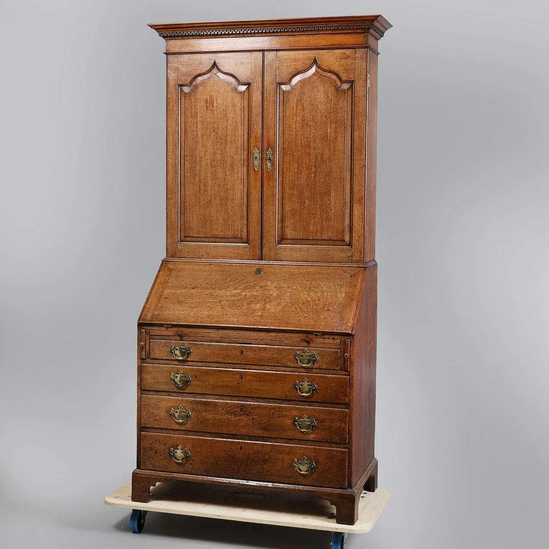 A GEORGE III OAK BUREAU BOOKCASE. — Cupboards, Cabinets & Shelves — Bishop & Miller