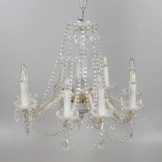 AN EARLY 20TH CENTURY CUT GLASS EIGHT BRANCH CHANDELIER.