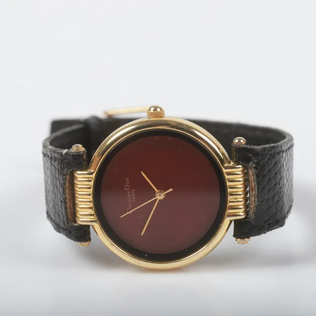 CHRISTIAN DIOR. Armbandsur, förgyllt stål, Paris.