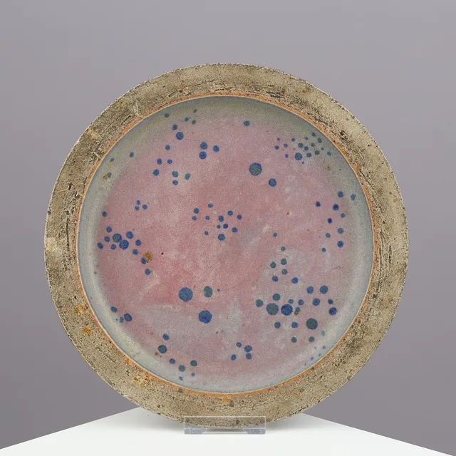 CHRISTIAN POULSEN (1911-91). Early, unique dish of partially glazed stoneware decorated with blue dots, made in own studio in Ørholm, Denmark, dated 1938.