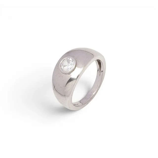Bombée ring with zircon solitaire.