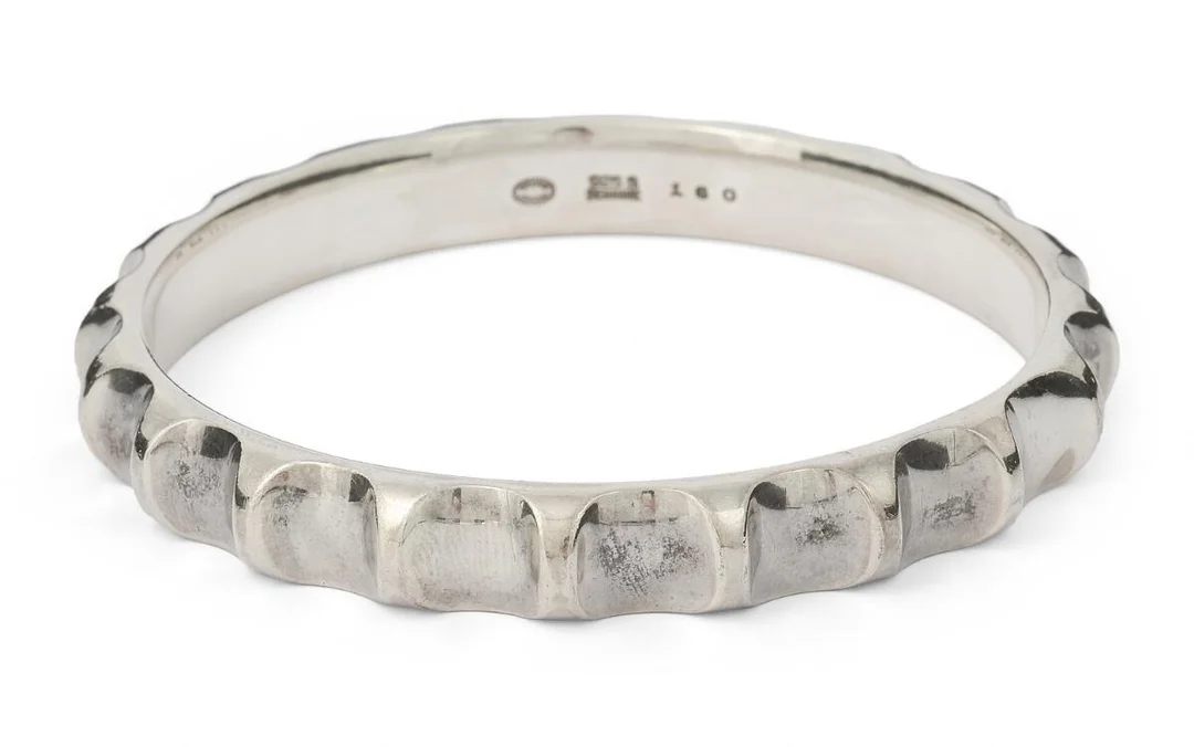 A bangle of sterling silver. Design no. 160. Weight app. 67 g. W. 9 mm. Inner diam. app. 6.3 cm. Georg Jensen after 1945. — Jewellery/Georg Jensen jewellery — Bruun Rasmussen