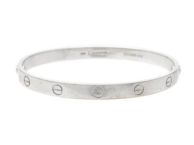 CARTIER, armband, Love bracelet,18K vitguld, ref. nr E63989, 1993, stl 19, vikt 37,2 g, skruvmejsel, slitage, reseetui.