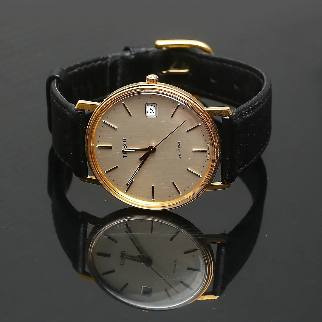TISSOT, armbandsur, quartz, "Seastar", boett i 18K guld. — Wristwatches — Auktionshuset Kolonn