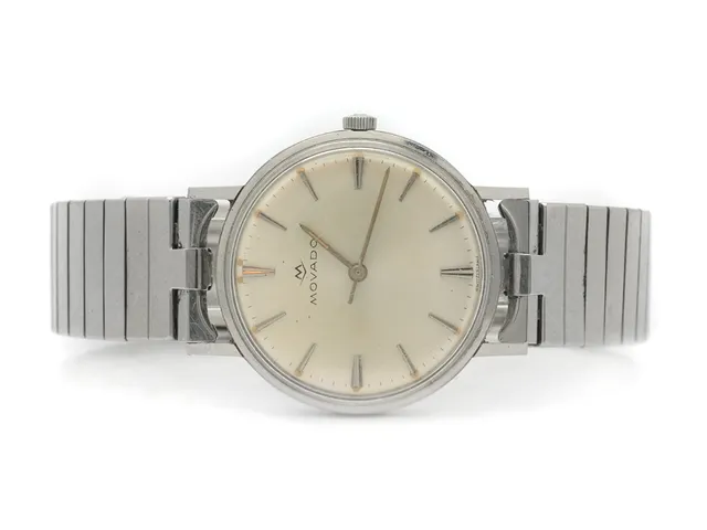 MOVADO, herrur, 33,5 mm, Ref nr. 823, Boett nr. 13089, stål, manuell, plexiglas, skadad urtavla, defekt, gravyr, ca 1968, metallänk ej original.