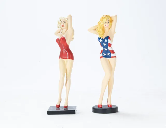 Two Pin-up figures made of painted art material, 21st century (2)