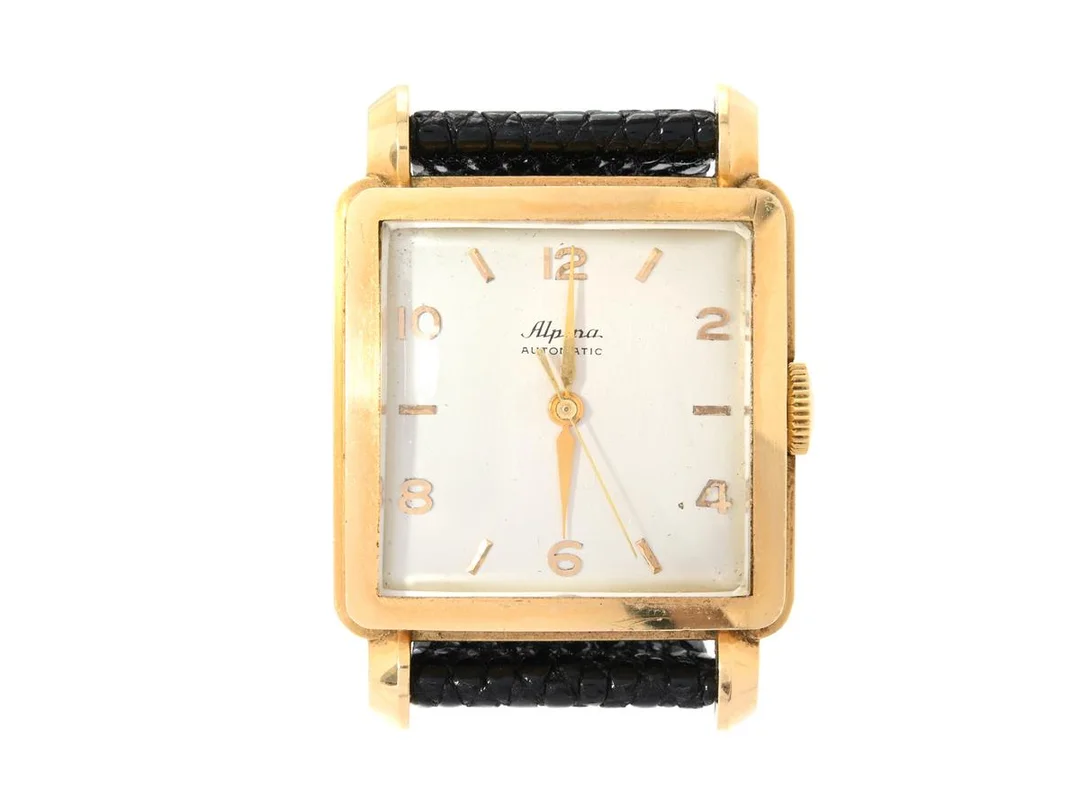 ALPINA, herrur, 30 x 30,5 (42) mm, Cal 584-3, Verk nr. 8007, Boett nr. 122375, 18K guld, hammarautomat, plexiglas, läderband, ca 1955. — Klockor/Alpina — Kaplans