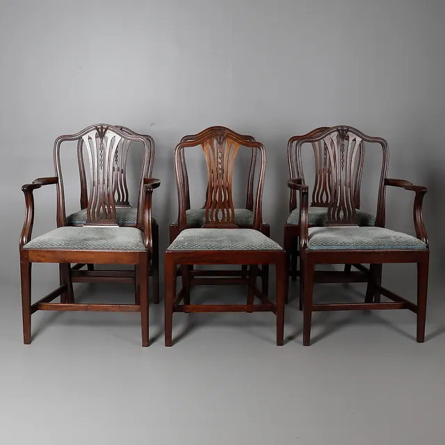 A SET OF SIX MAHOGANY DINING CHAIRS.