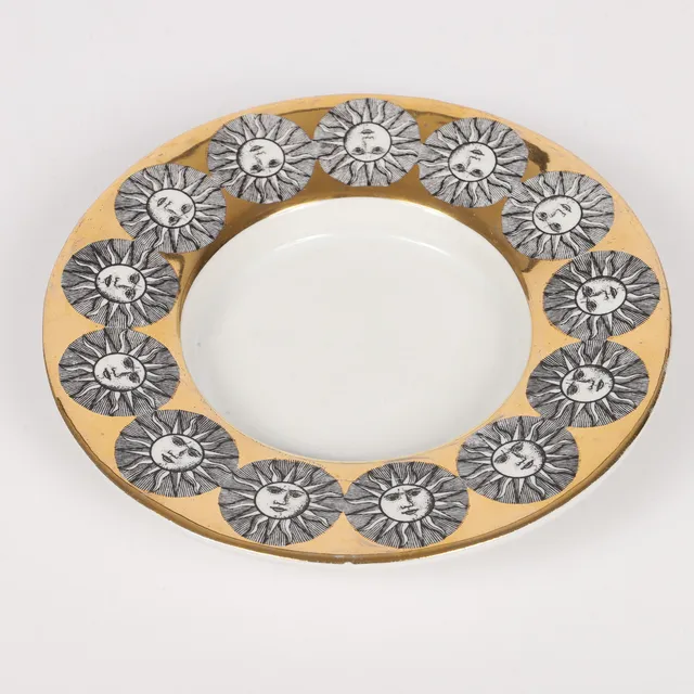 PIERO FORNASETTI. Fat, porslin med soldekor, Italien.
