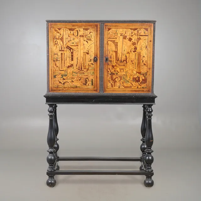 A 17TH CENTURY SOUTH GERMAN WALNUT AND FRUITWOOD MARQUETRY CABINET.
