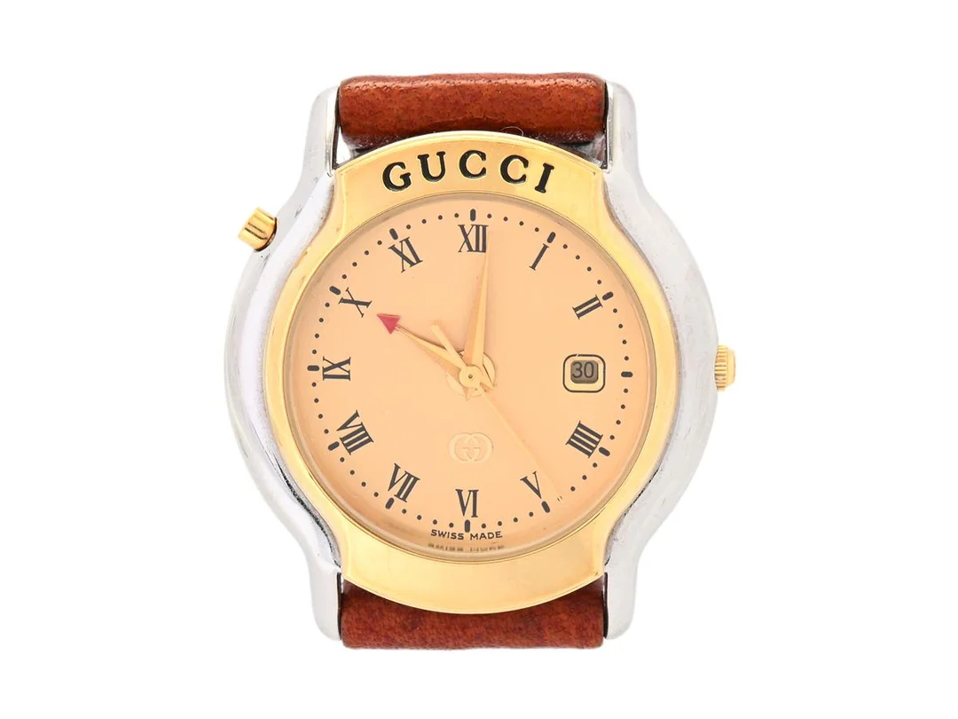 GUCCI, Mondiale, Serie nr. 016-742, Boett nr. 8200 JR, damur, 30 mm, biolour, quartz, mineralglas, datum, läderband, originalspänne i doublé, ca 1990, box, ytterkartong. — Klockor/Gucci — Kaplans