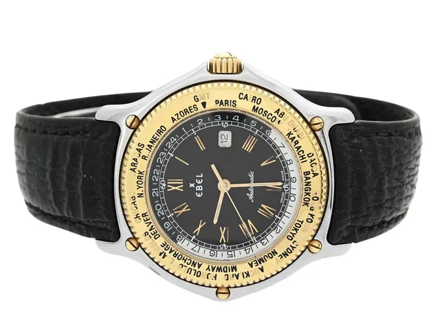 EBEL, Voyager, Cal 124 (ETA 2892A2), Serie nr. 34601872, Ref nr. 1124913, herrur, 39 mm, stål/guld, automatisk, safirglas, världstidsvisning, skadad urtavla, integrerat läderband, viklås, cert, maj 1990.