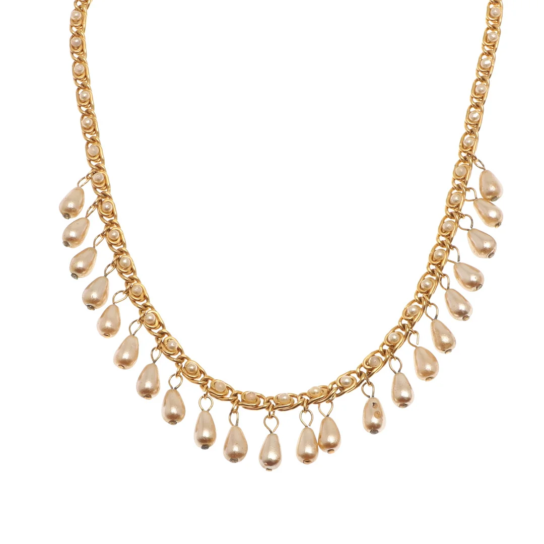 A GILT METAL AND IMITATION PEARL NECKLACE BY CHANEL. — Necklace — Lawrences Auctioneers
