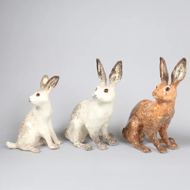 THREE WINSTANLEY POTTERY MODELS OF HARES (3).