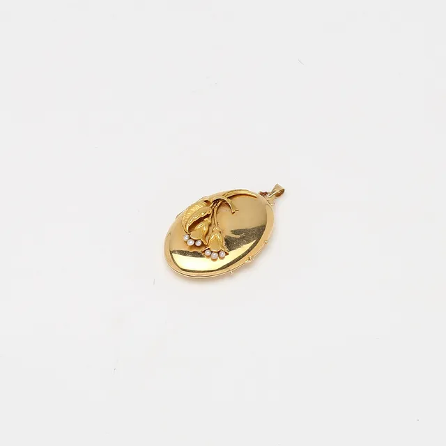 HÄNGE / MEDALJONG, 18K guld. Vikt ca 18,3 g.