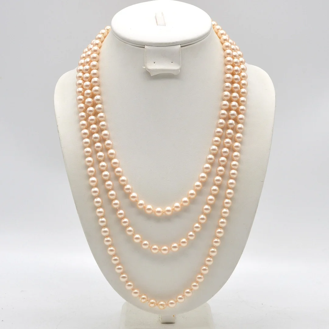 LANGES PERLENCOLLIER, EINZELN GEKNÜPFT, ENDLOSKETTE, GOLDENE FARBE, 20. JAHRHUNDERT. — Necklace — Kunst- und Auktionshaus Kleinhenz