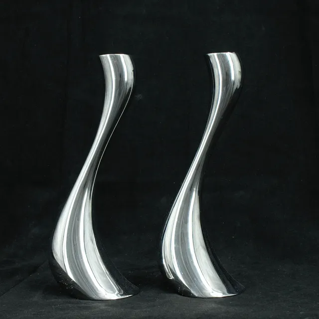 CONSTANTIN WORTMANN. Ljusstakar, 2 st, "Cobra", metall, Georg Jensen, 1900-talets andra hälft, Danmark.