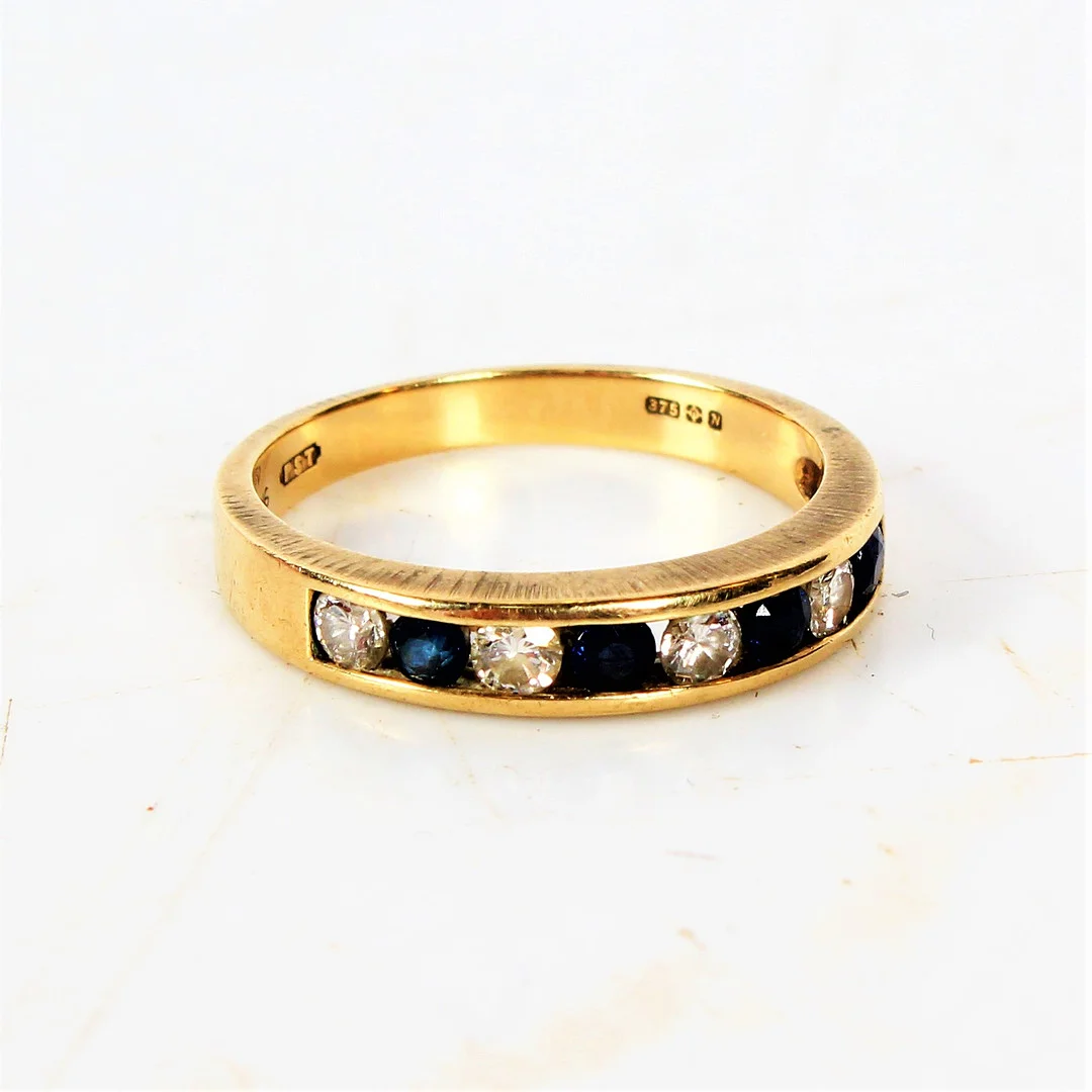 9 CARAT GOLD DIAMOND AND SAPPHIRE RING. — Rings — Bishop & Miller