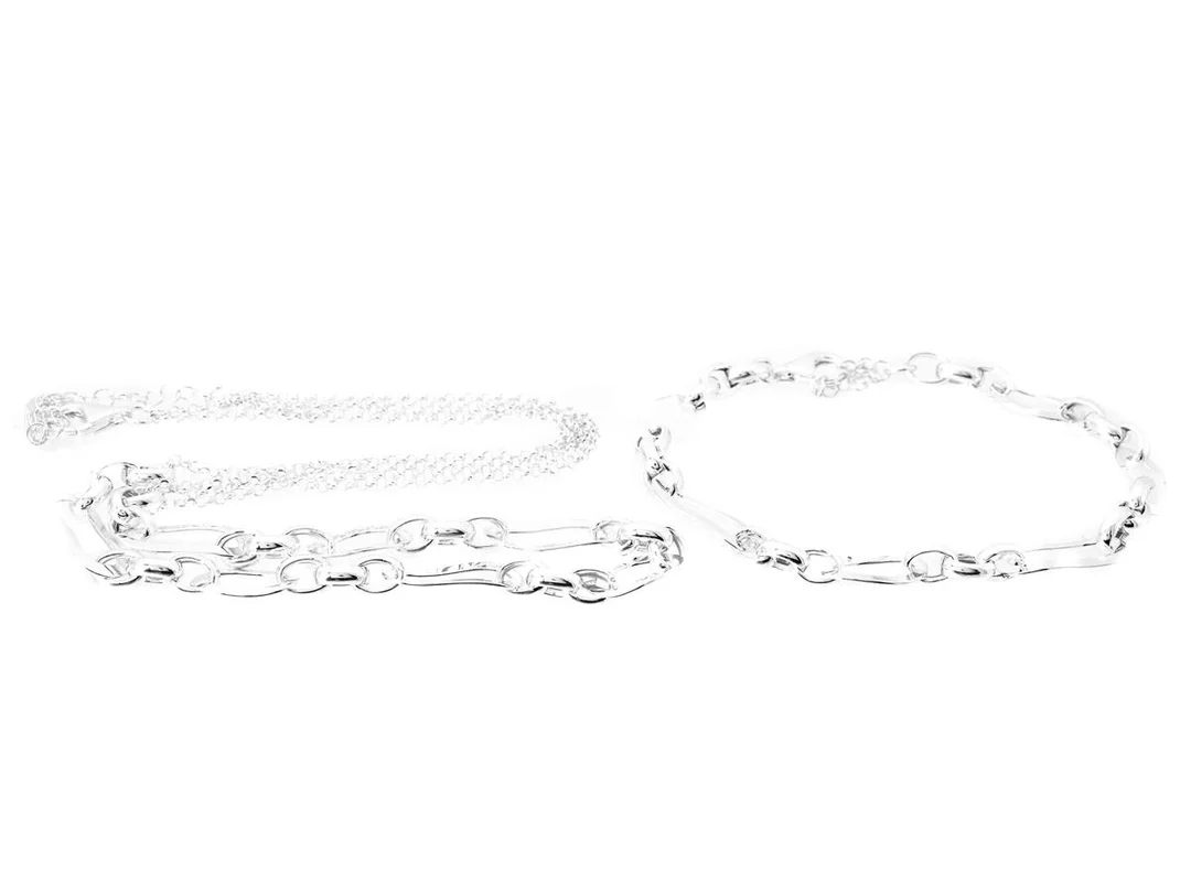SMYCKESET, 1 collier, 1 armband, sterlingsilver, justerbara längder 53-58 cm & 20-23 cm, vikt ca 21,7 g. — Smycken/Smyckeset — Kaplans