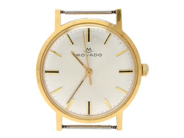 MOVADO, herrur, 34 mm, Cal 2542, Boett nr. 517 / 126214029, 18K guld, manuell, plexiglas, skadad urtavla, gravyr, ca 1969.