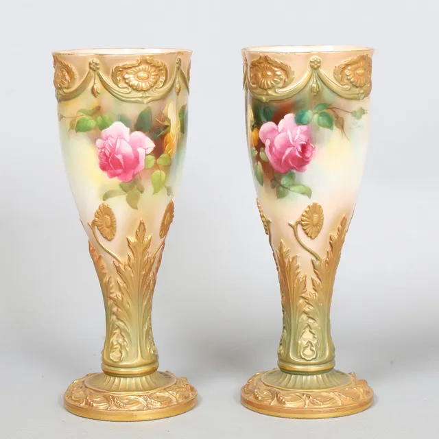 A PAIR OF ROYAL WORCESTER BLUSH IVORY AND ROSE PAINTED VASES (2).