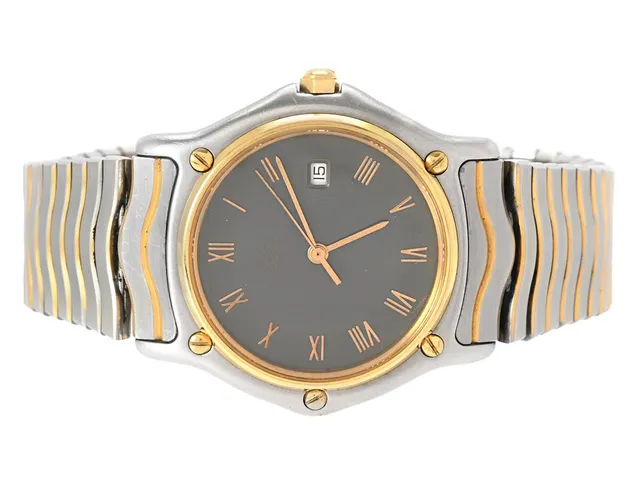 EBEL, Sport Classic, Cal 83, Serie nr. 13638317, Boett nr. 183909, unisex, 31 mm, stål/guld, quartz, safirglas (nagg), datum, skadad urtavla, se fördjupad info, integrerad originallänk (skadad, se bilder och fördjupad information), viklås, Ref nr. 1190, ca 1990.