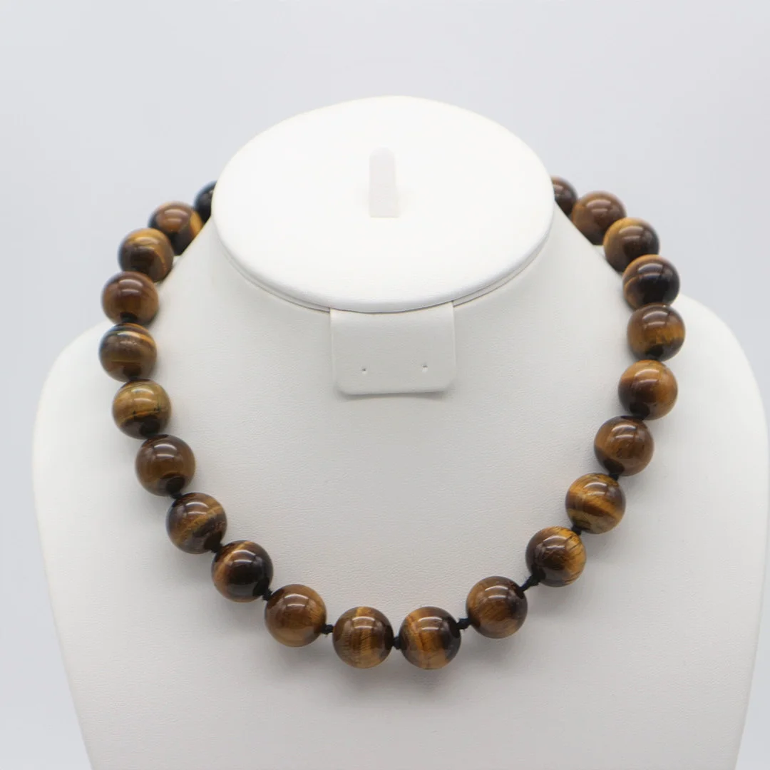 TIGERAUGE KETTE MIT 25 STEINEN. — Necklace — Kunst- und Auktionshaus Kleinhenz