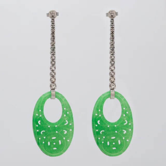 Diamonds and jade long earrings.