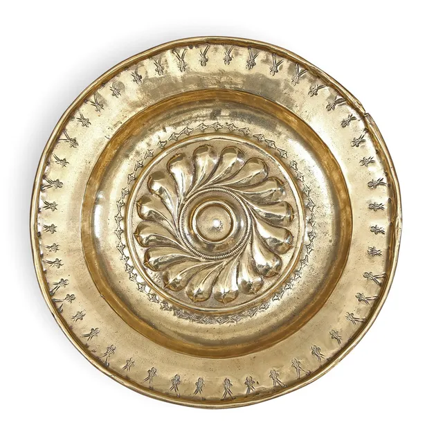 Charity dish in brass, from Dinant or Nuremberg, 16th Century.