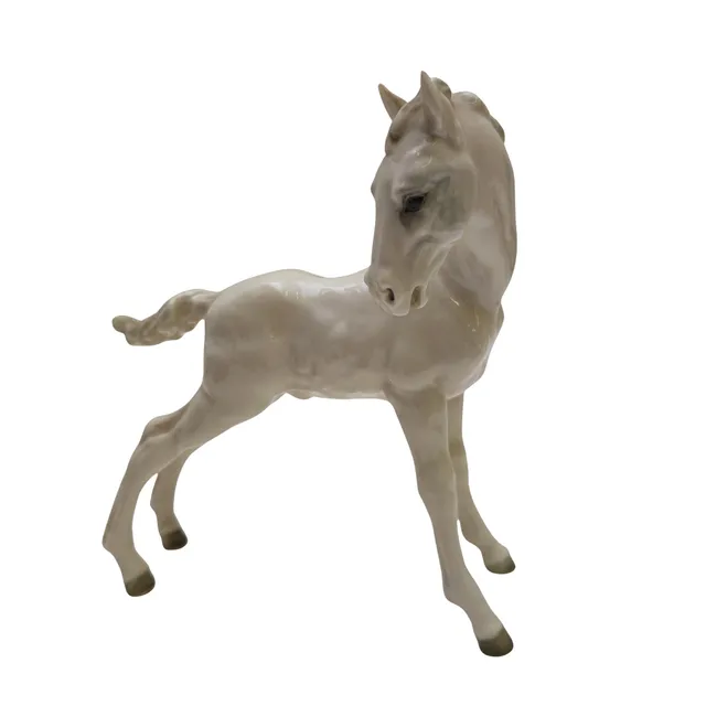 KARL TUTTER. HUTSCHENREUTHER. CABALLO PORCELANA. SELLO EN LA BASE.