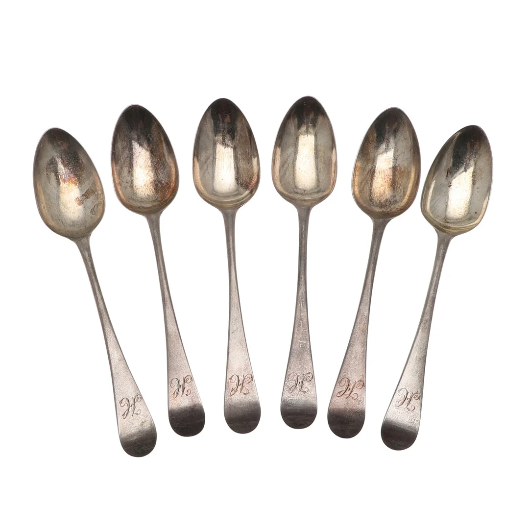 A SET OF SIX GEORGE III SILVER OLD ENGLISH PATTERN DESSERT SPOONS. — Silver — Lawrences Auctioneers