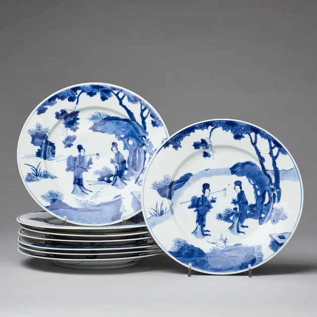 A Set of Eight Blue and White Plates.