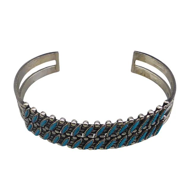 MANSCHETTENARMBAND AUS STERLINGSILBER MIT TÜRKISEN.