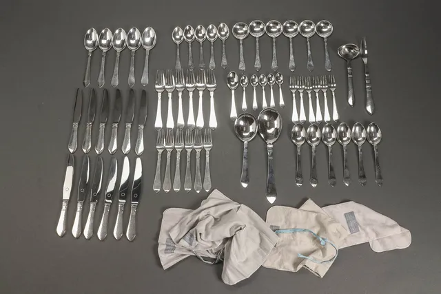 Georg Jensen 'Antik/Continental' cutlery in hammered sterling silver. (62)
