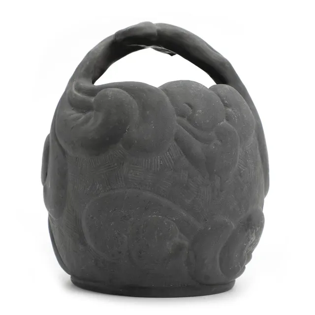 Small bowl in black terracotta, decorated with ornaments. Manufactured by L. Hjorth, no. 765, Bornholm. H. 19.5 cm.