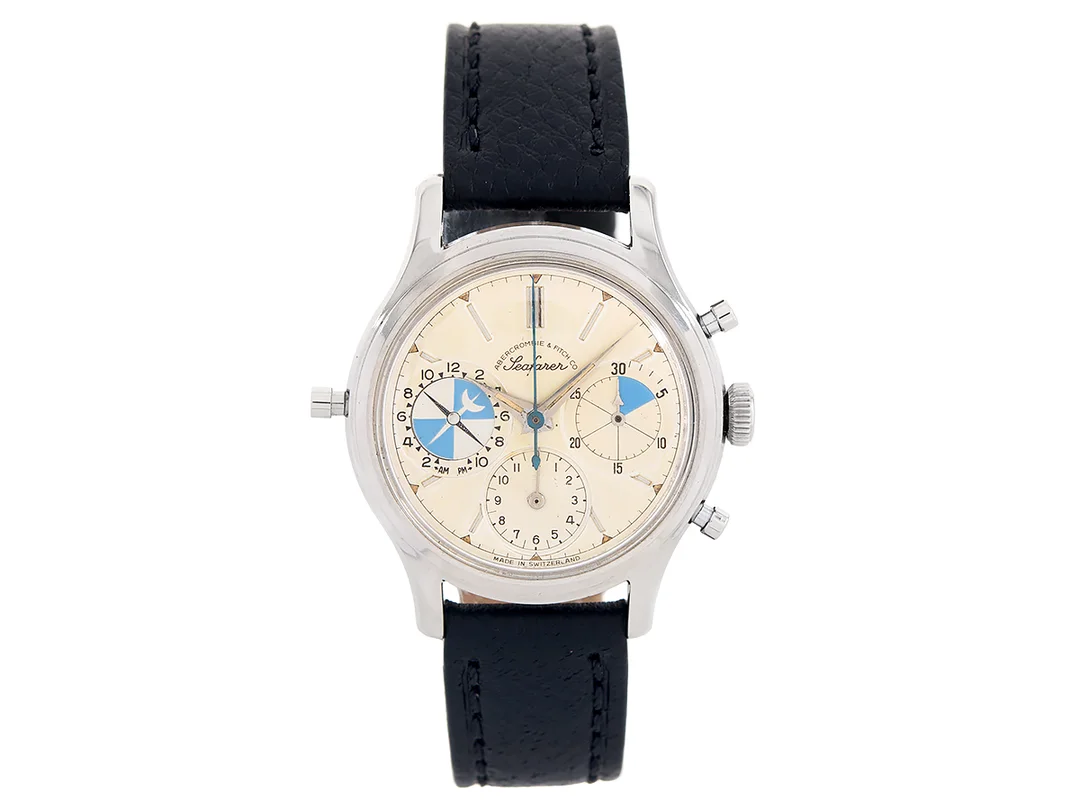 HEUER, Seafarer, Abercrombie & Fitch Co, "Second Execution Dial", Cal Valjoux 721, Serie nr. 456132, Ref nr. 2444, Boett nr. 42571, kronograf, herrur, 35,5 mm, stål, manuell, plexiglas, tidvattenvisare, boett signerad "Abercrombie & Fitch Co", gravyr, läderband, ca 1960. — Klockor/Tag Heuer — Kaplans