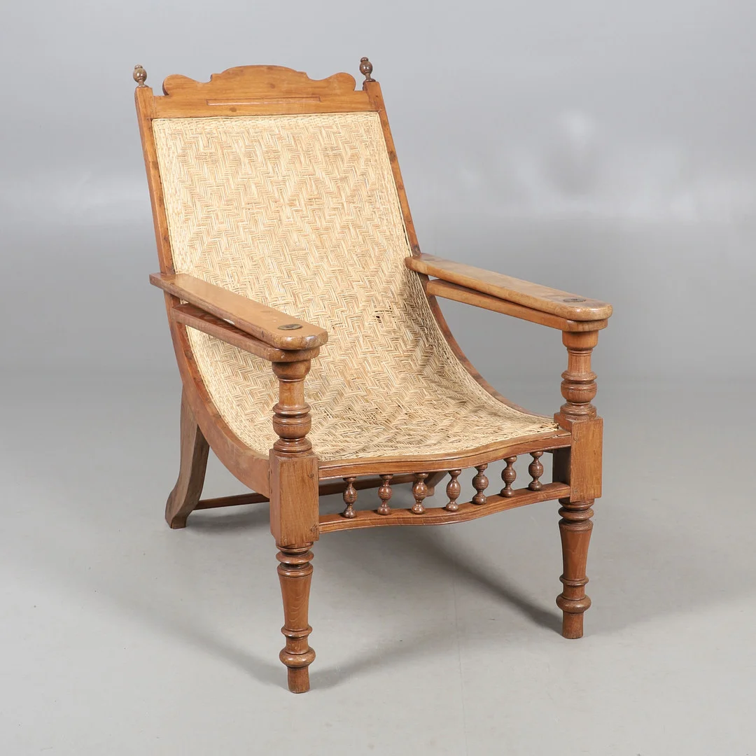 A 20TH CENTURY TEAK AND WICKER 'PLANTATION' CHAIR. — Armchairs & Chairs — Lawrences Auctioneers
