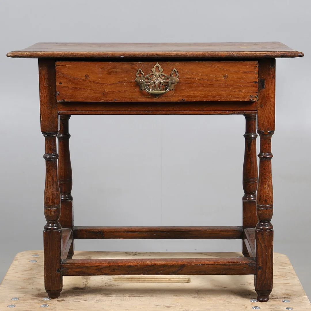 AN EIGHTEENTH CENTURY OAK SIDE TABLE. — Tables — Lawrences Auctioneers