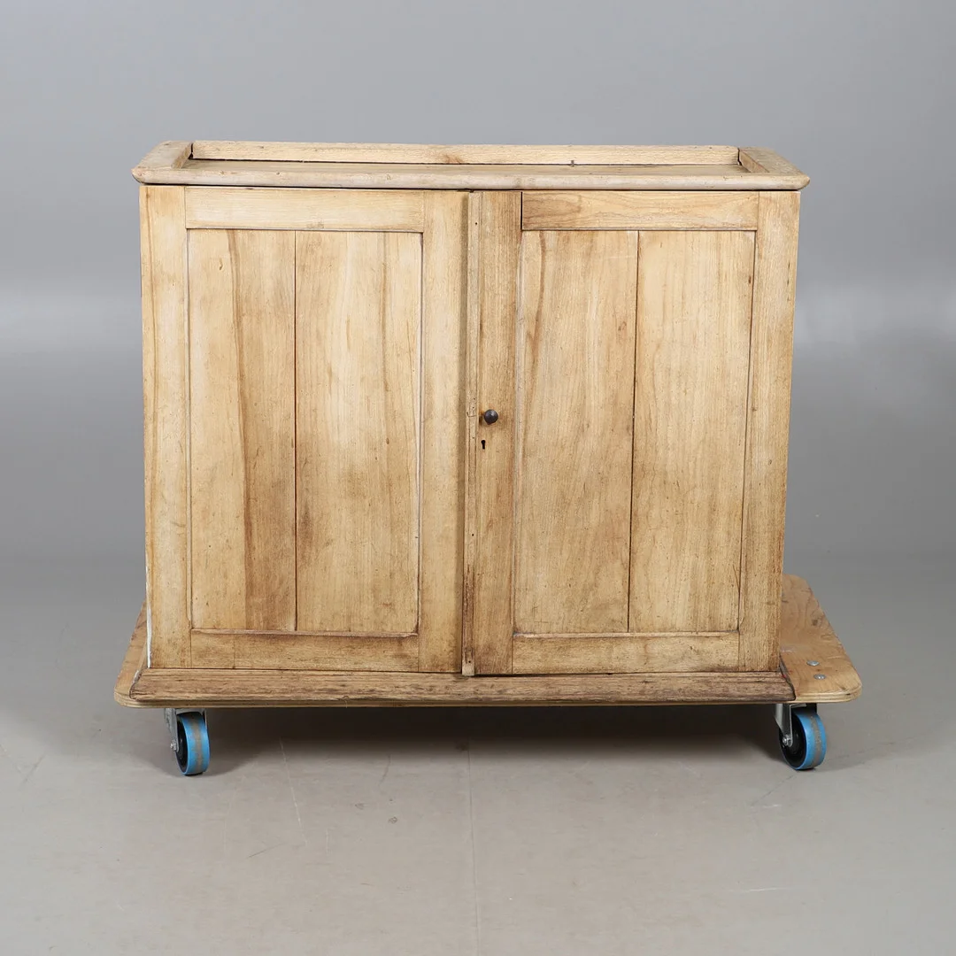 A STRIPPED AND WAXED PINE TWO DOOR CUPBOARD. — Cupboards, Cabinets & Shelves — Lawrences Auctioneers