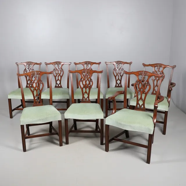 A SET OF EIGHT REPRODUCTION CHIPPENDALE PATTERN MAHOGANY DINING CHAIRS.