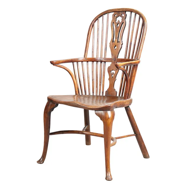A MID 18TH CENTURY YEW WOOD & ELM WINDSOR ARMCHAIR.