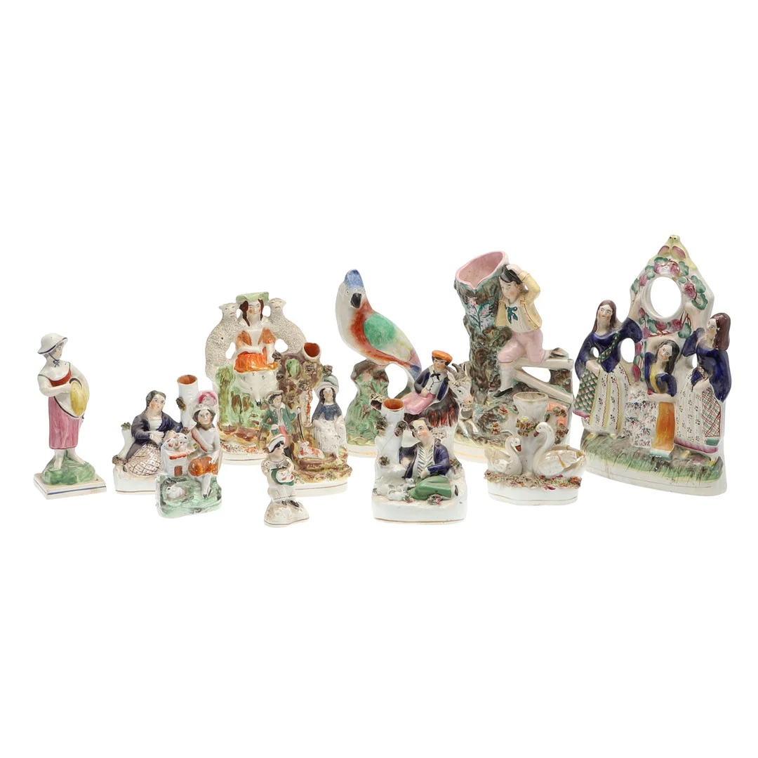 A GROUP OF STAFFORDSHIRE POTTERY FIGURES & SPILL VASES. — European — Lawrences Auctioneers