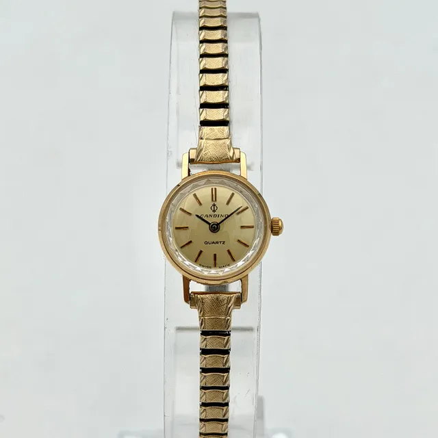 CANDINO, armbandsur, guld 14k, 1980-tal, quartz, flexiarmband i metall.