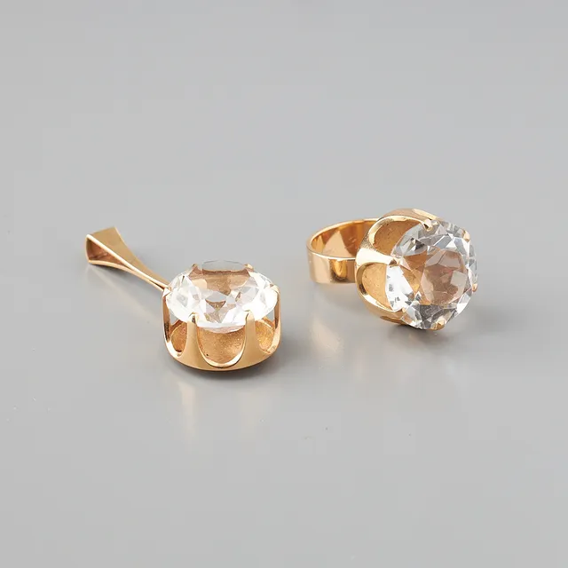 ELIS KAUPPI. RING OCH HÄNGE, syntetisk spinell, 14K guld, Kupittaan Kulta 1966.