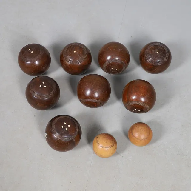 A COLLECTION OF LIGNUM VITEA LAWN BOWELS.