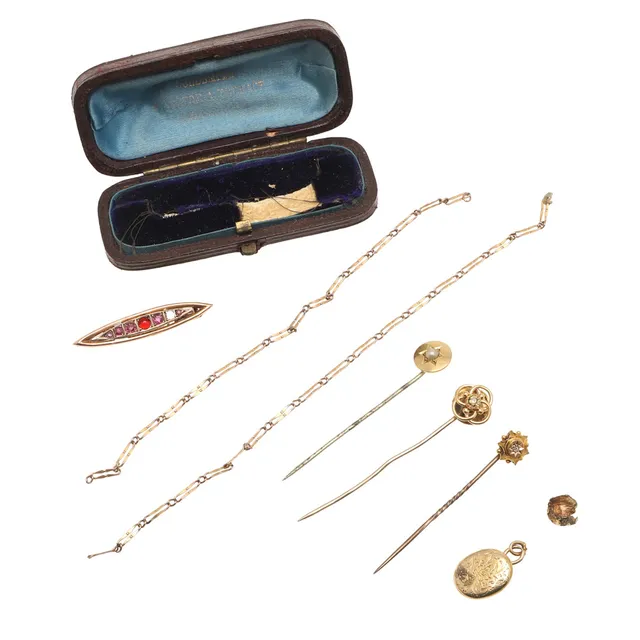 THREE GOLD STICKPINS, A GOLD BROOCH ETC.