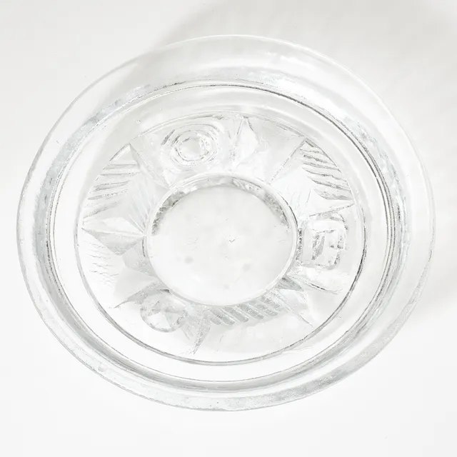 CHRISTER SJÖGREN. Skål, Lindshammars Glasbruk, 1960-tal, gjuten glasmassa i klarglas med geometrisk dekor.
